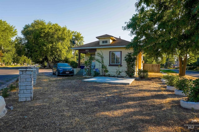 view of front of house with fence