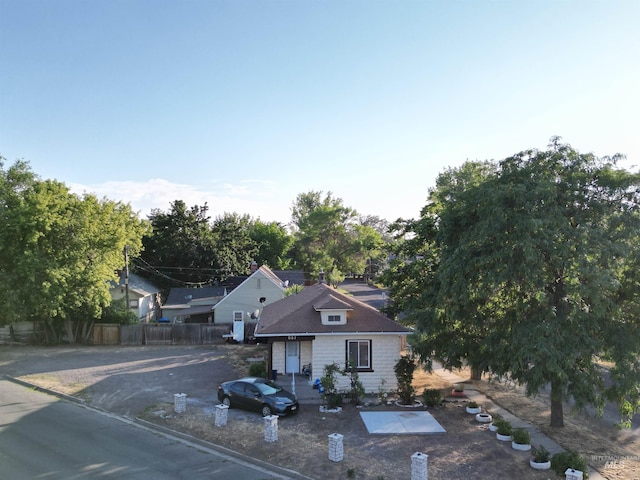 view of front of house with fence