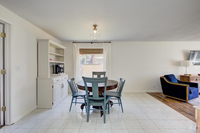 1214 E Pennsylvania Pl, Nampa, ID 83686 - dining area featuring baseboards and light tile patterned floors
