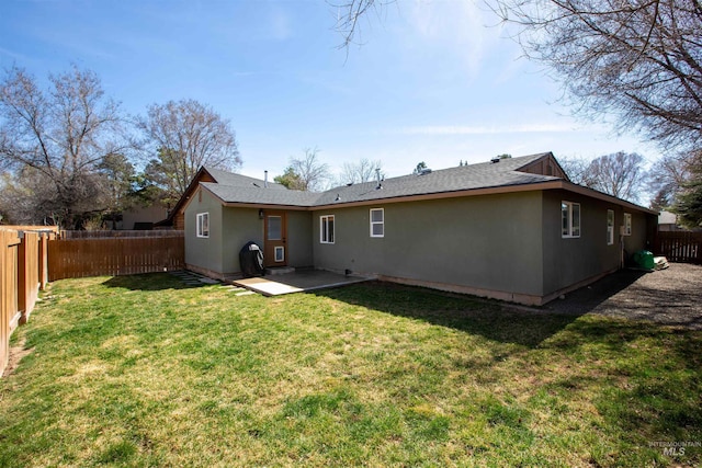 1214 E Pennsylvania Pl, Nampa, ID 83686 - rear view of house with a patio area and stucco siding