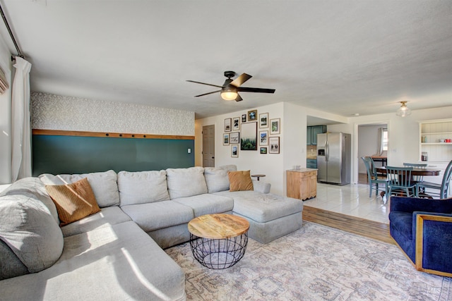 1214 E Pennsylvania Pl, Nampa, ID 83686 - living room featuring ceiling fan and light wood-type flooring