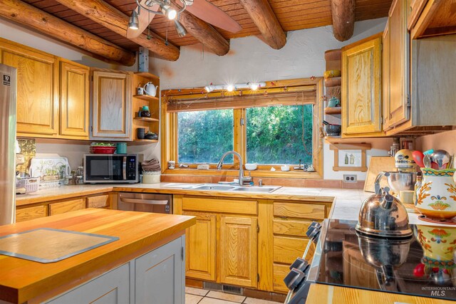 39055 Hilltop Ln, Lewiston, ID 83501 - kitchen with stainless steel appliances, a sink, open shelves, a ceiling fan, and wooden ceiling with exposed beams