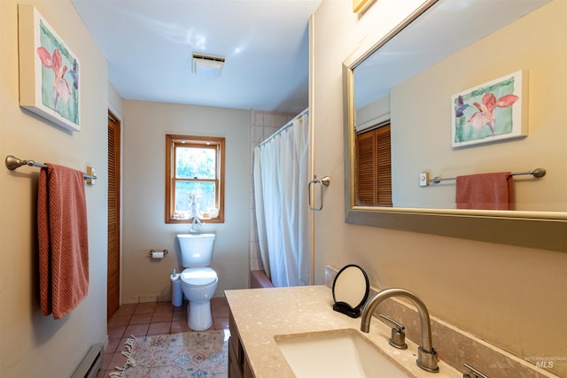 39055 Hilltop Ln, Lewiston, ID 83501 - bathroom featuring vanity, tile patterned flooring, toilet, a shower with curtain, and a closet