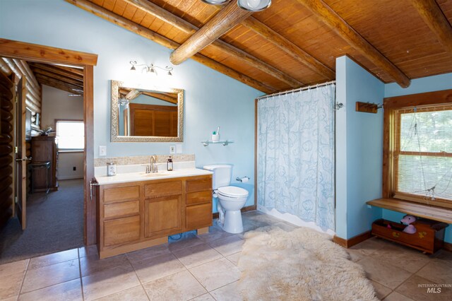 39055 Hilltop Ln, Lewiston, ID 83501 - bathroom featuring wooden ceiling, vanity, toilet, curtained shower, and tile patterned flooring