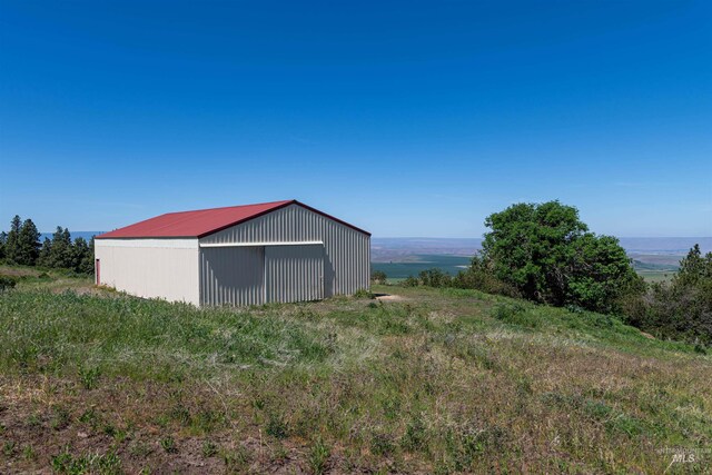 39055 Hilltop Ln, Lewiston, ID 83501 - view of yard with a pole building and an outdoor structure