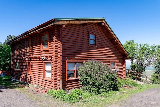 39055 Hilltop Ln, Lewiston, ID 83501 - view of property exterior featuring log siding