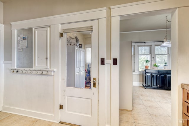 hallway featuring light tile flooring