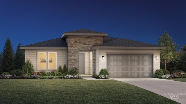 view of front of property with stone siding, driveway, an attached garage, and a lawn