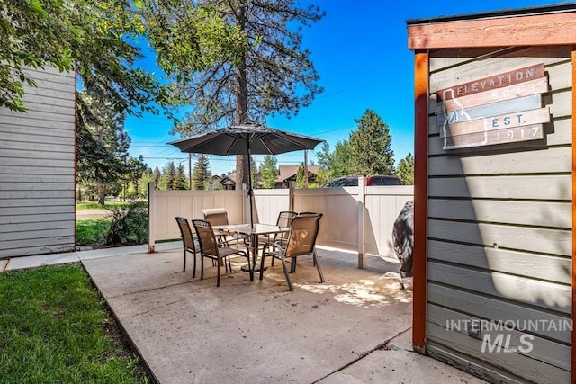 601 Hemlock St Unit 3, Mccall, ID 83638 - view of patio with outdoor dining space