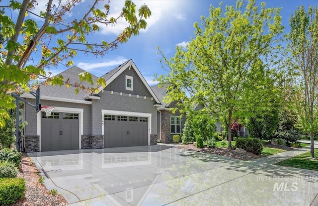 3345 W Dublin St, Eagle, ID 83616 - view of front of house featuring stone siding, concrete driveway, an attached garage, and board and batten siding