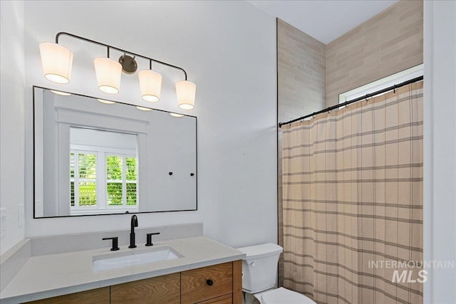 3345 W Dublin St, Eagle, ID 83616 - full bath featuring toilet, vanity, and a shower with curtain