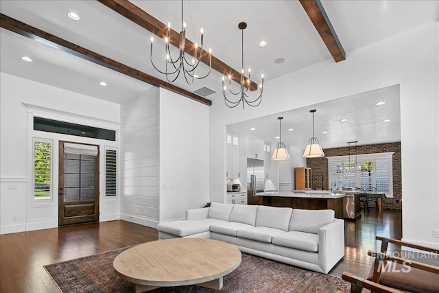 3345 W Dublin St, Eagle, ID 83616 - living room with beamed ceiling, dark wood-style floors, recessed lighting, and a chandelier