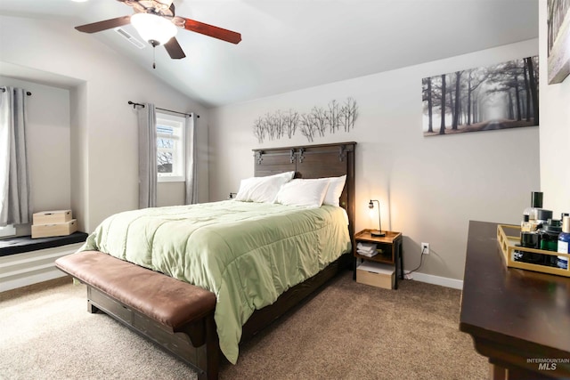 carpeted bedroom featuring lofted ceiling, ceiling fan, visible vents, and baseboards