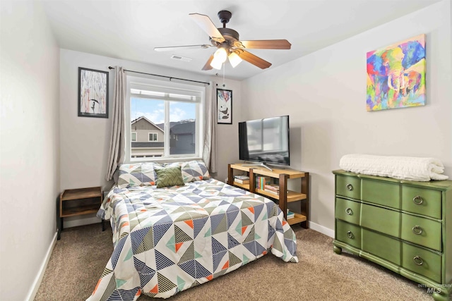 bedroom featuring visible vents, ceiling fan, light carpet, and baseboards