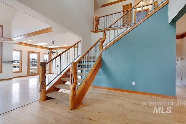 stairway featuring hardwood / wood-style floors