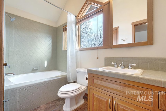 full bathroom with vanity, vaulted ceiling, tile patterned flooring, toilet, and shower / bathtub combination with curtain