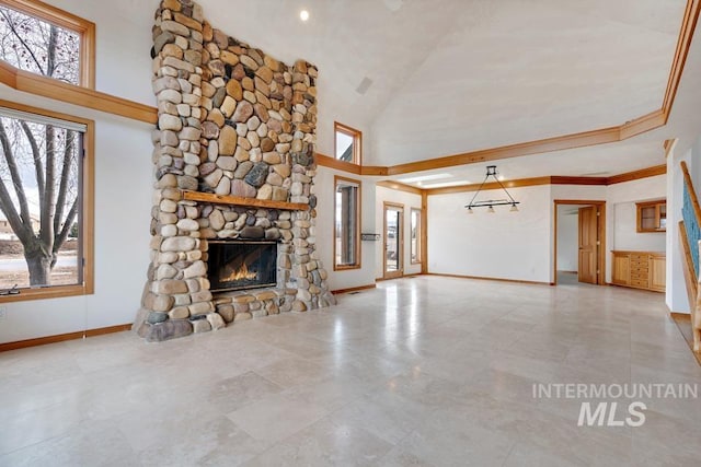 unfurnished living room featuring a stone fireplace