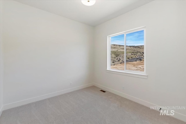 6535 S Evie Way, Eagle, ID 83714 - unfurnished room featuring baseboards and light colored carpet