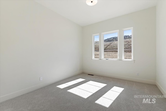 6535 S Evie Way, Eagle, ID 83714 - carpeted empty room featuring baseboards