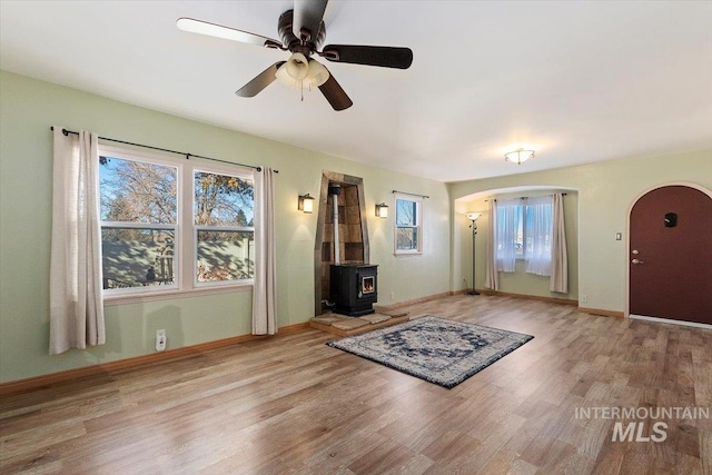 120 W Main St, Hagerman, ID 83332 - entryway with light wood-type flooring, a wood stove, and ceiling fan