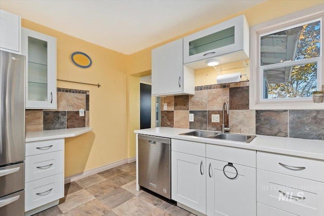 120 W Main St, Hagerman, ID 83332 - kitchen featuring appliances with stainless steel finishes, white cabinetry, and sink