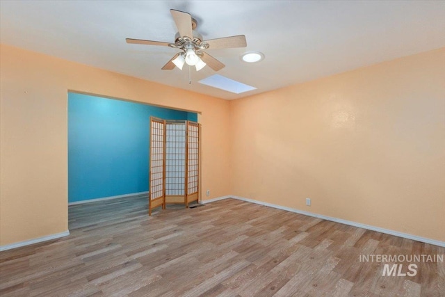 120 W Main St, Hagerman, ID 83332 - empty room with light hardwood / wood-style floors and ceiling fan