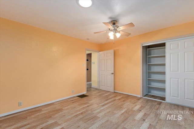120 W Main St, Hagerman, ID 83332 - unfurnished bedroom featuring a closet, light hardwood / wood-style flooring, and ceiling fan