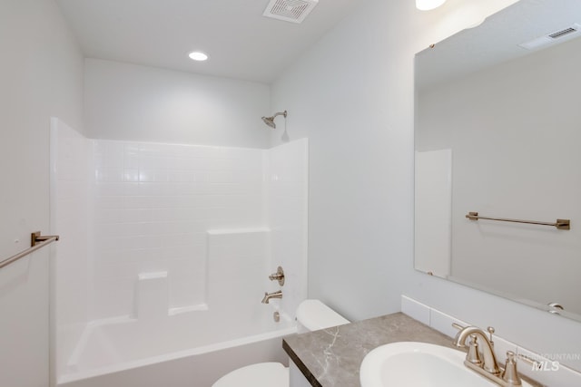 full bathroom with vanity, bathtub / shower combination, and toilet