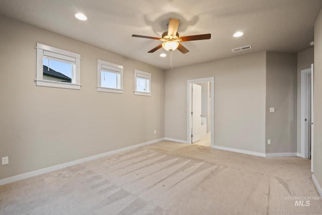 10449 W Thimbleberry Dr, Star, ID 83669 - unfurnished bedroom featuring light colored carpet, recessed lighting, connected bathroom, and a ceiling fan
