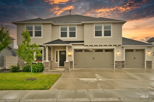10449 W Thimbleberry Dr, Star, ID 83669 - prairie-style house with driveway, stone siding, a shingled roof, and a garage