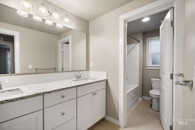 10449 W Thimbleberry Dr, Star, ID 83669 - bathroom with double vanity, shower / tub combination, and tile patterned floors