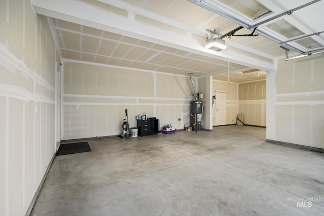 10449 W Thimbleberry Dr, Star, ID 83669 - garage with a garage door opener and water heater