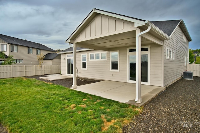 10449 W Thimbleberry Dr, Star, ID 83669 - back of house with board and batten siding and a patio area