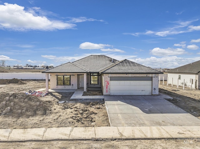 view of front of home with a garage