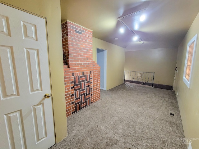 921 14th St, Lewiston, ID 83501 - carpeted spare room with rail lighting