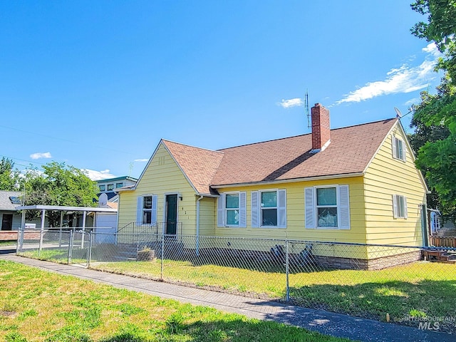 921 14th St, Lewiston, ID 83501 - view of front facade with a chimney and roof with shingles