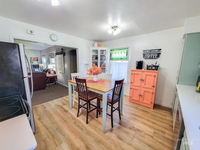 921 14th St, Lewiston, ID 83501 - dining space featuring light wood-style floors and baseboards