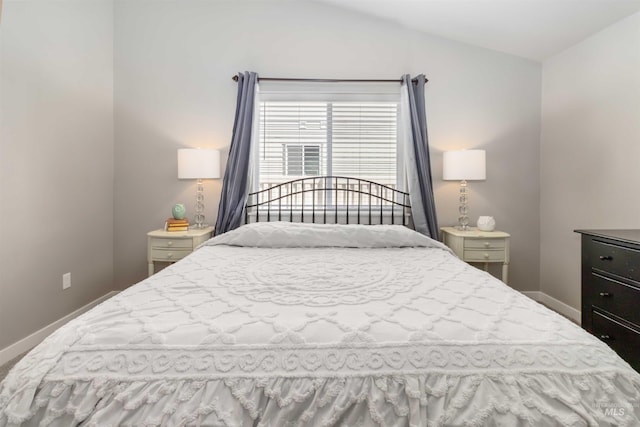 bedroom featuring baseboards