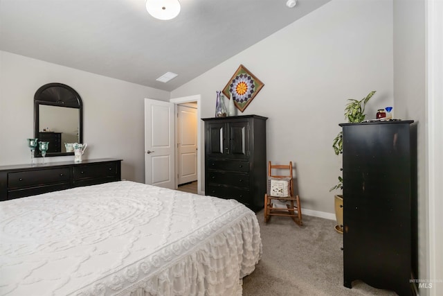 bedroom featuring carpet floors, lofted ceiling, and baseboards
