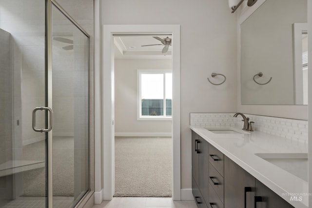 bathroom with ceiling fan, tile patterned floors, an enclosed shower, and vanity