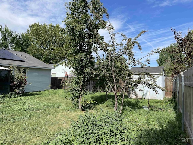 14285 Shenandoah St, Caldwell, ID 83607 - fenced backyard with a storage shed