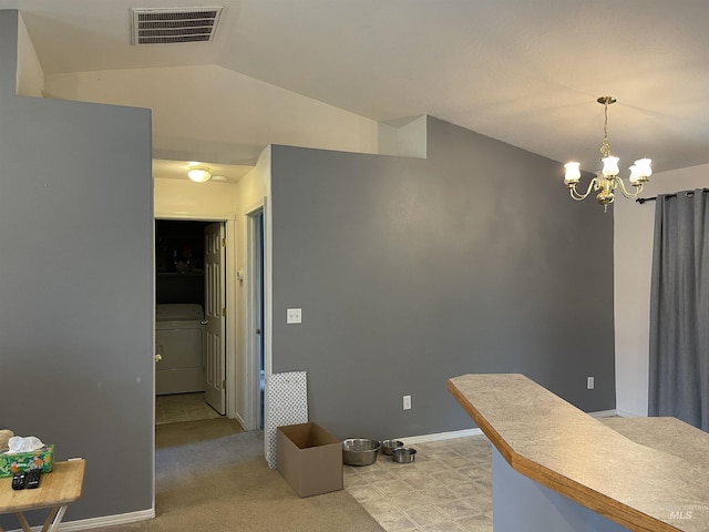 14285 Shenandoah St, Caldwell, ID 83607 - dining space featuring washer / clothes dryer, a chandelier, and vaulted ceiling
