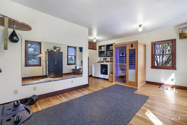 133 N Rd, Jerome, ID 83338 - exercise room with washer / dryer, light wood finished floors, and baseboards