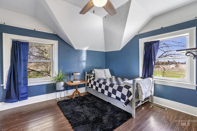 133 N Rd, Jerome, ID 83338 - bedroom with wood-type flooring, vaulted ceiling, and multiple windows