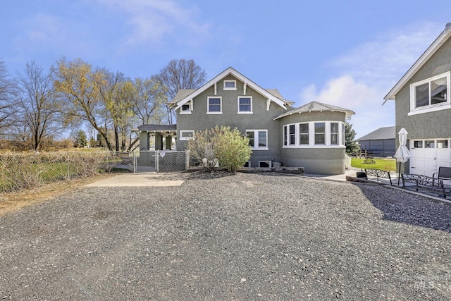 133 N Rd, Jerome, ID 83338 - rear view of property with fence and stucco siding