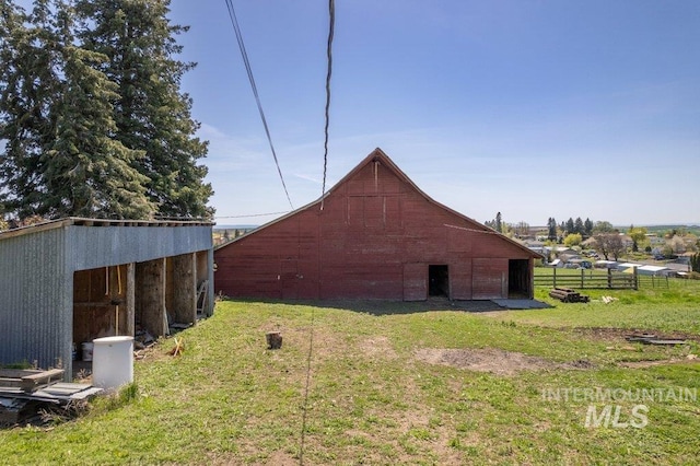 1045 N Beech Rd, Genesee, ID 83832 - view of barn with a yard and fence