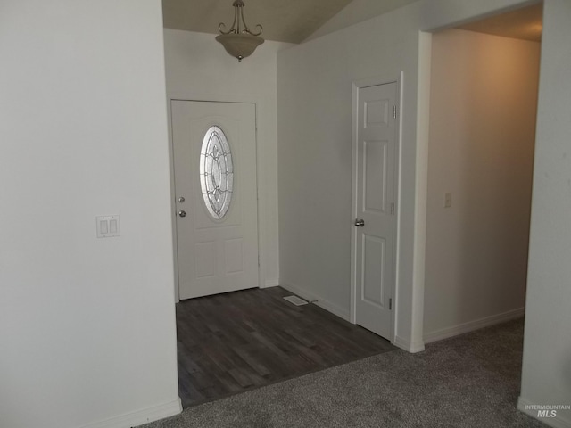 view of carpeted entrance foyer