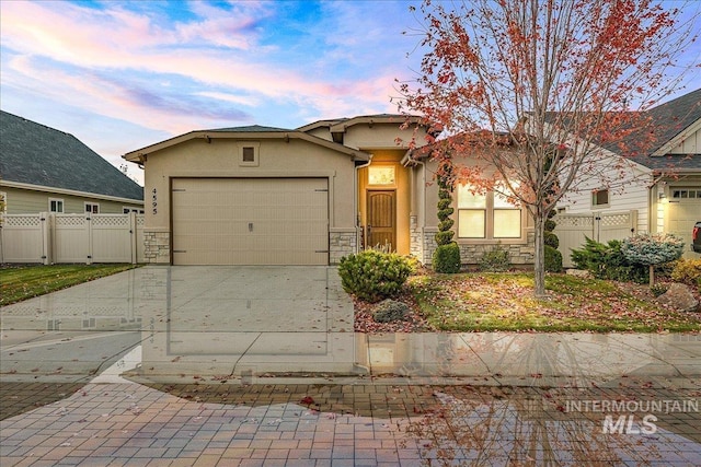 view of front of home featuring a garage