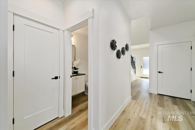 hallway featuring light hardwood / wood-style floors