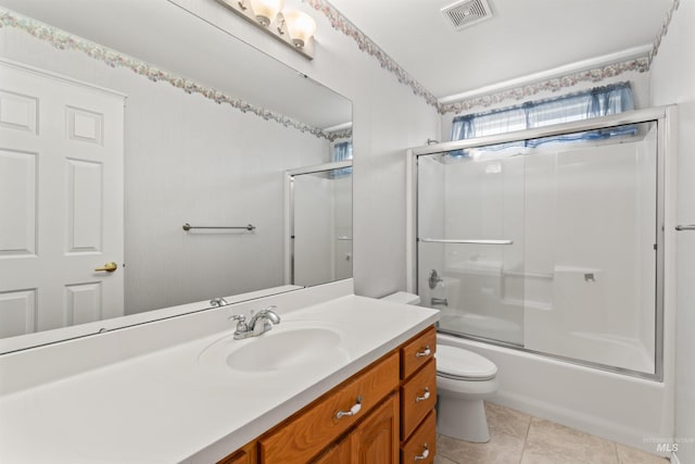 1728 S Labrador Pl, Meridian, ID 83642 - bathroom featuring vanity, tile patterned floors, and combined bath / shower with glass door